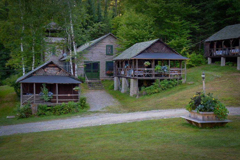 Adirondack cabins on the grounds at Ogontz
