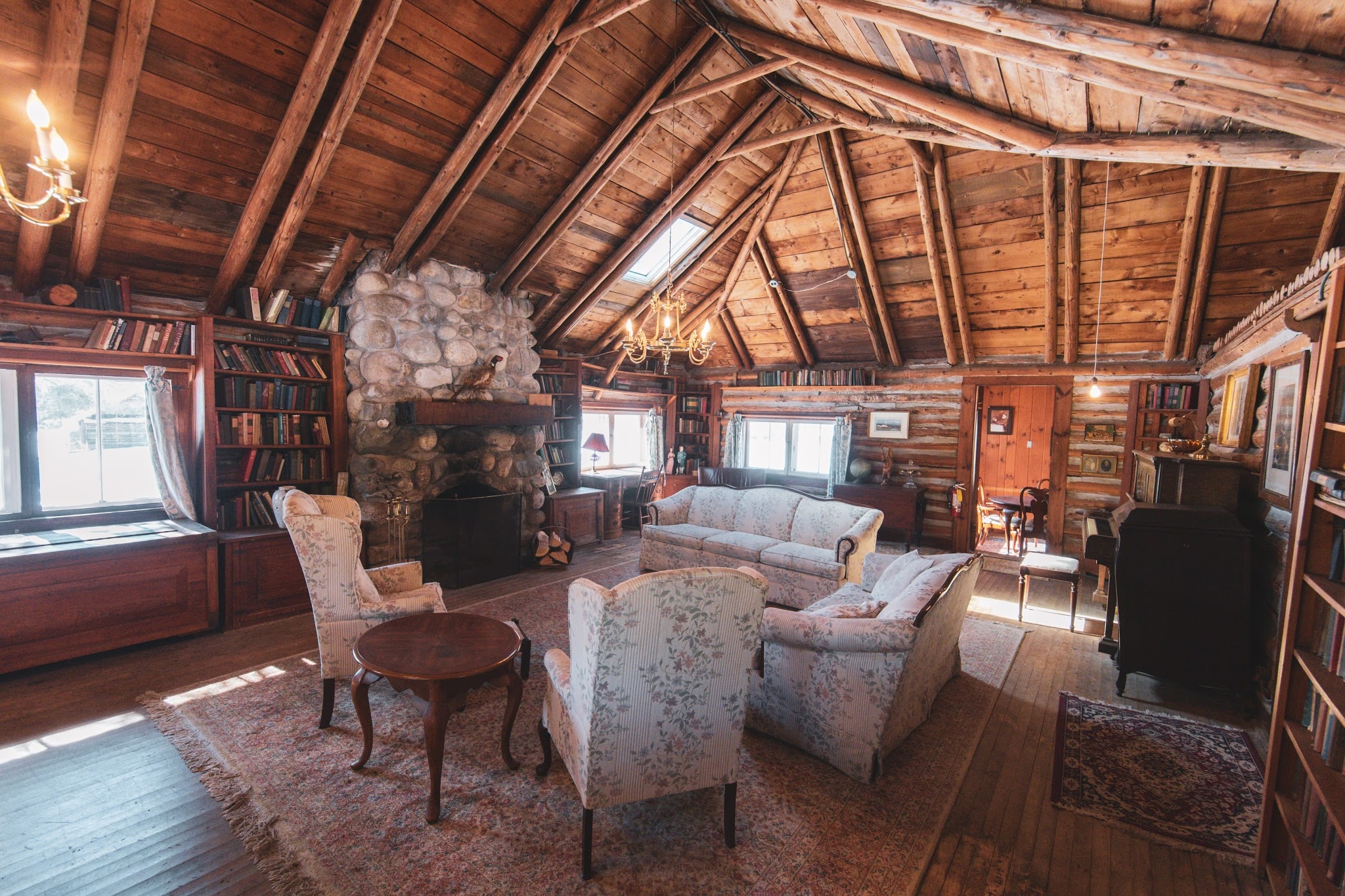 Sutherland lodge living room with stone fireplace