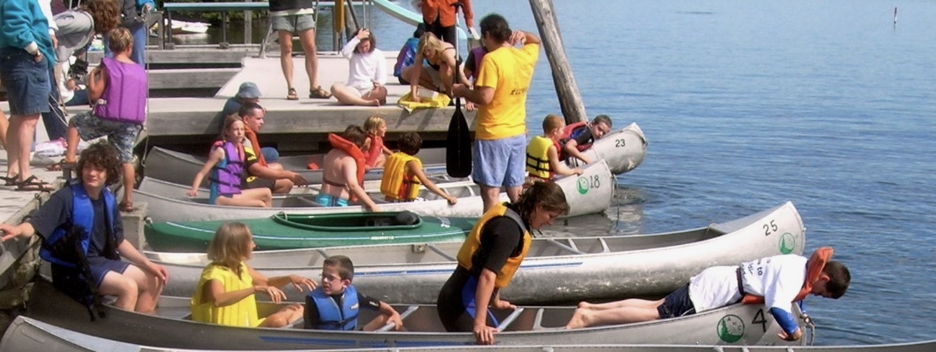 Kids in canoes at Three Mile Island water events