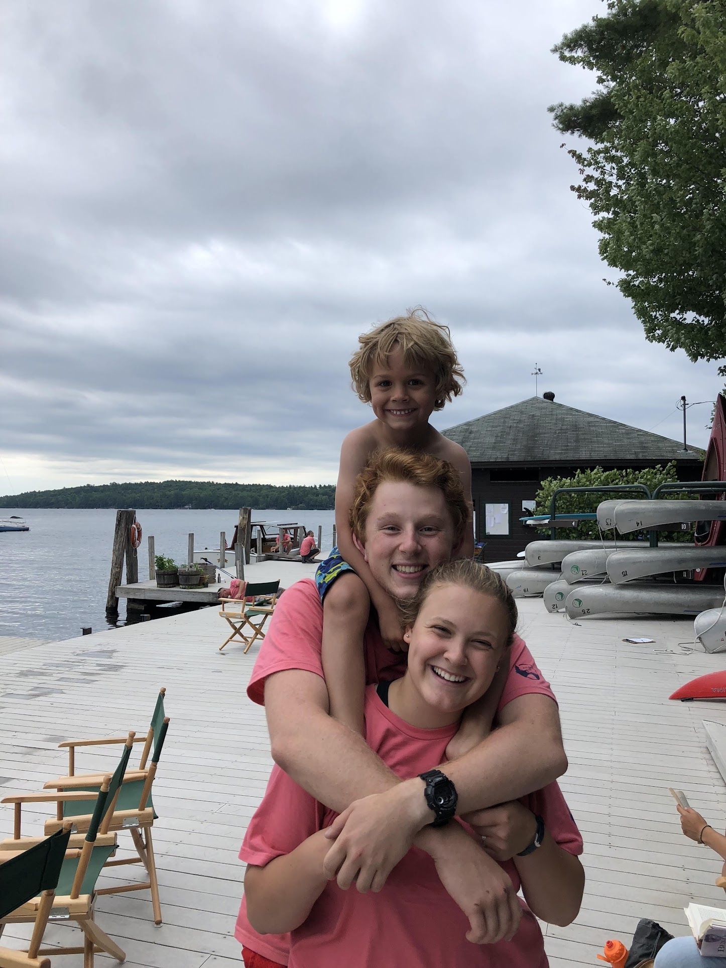 Anna, Alex, and a camper stacked up on the dock