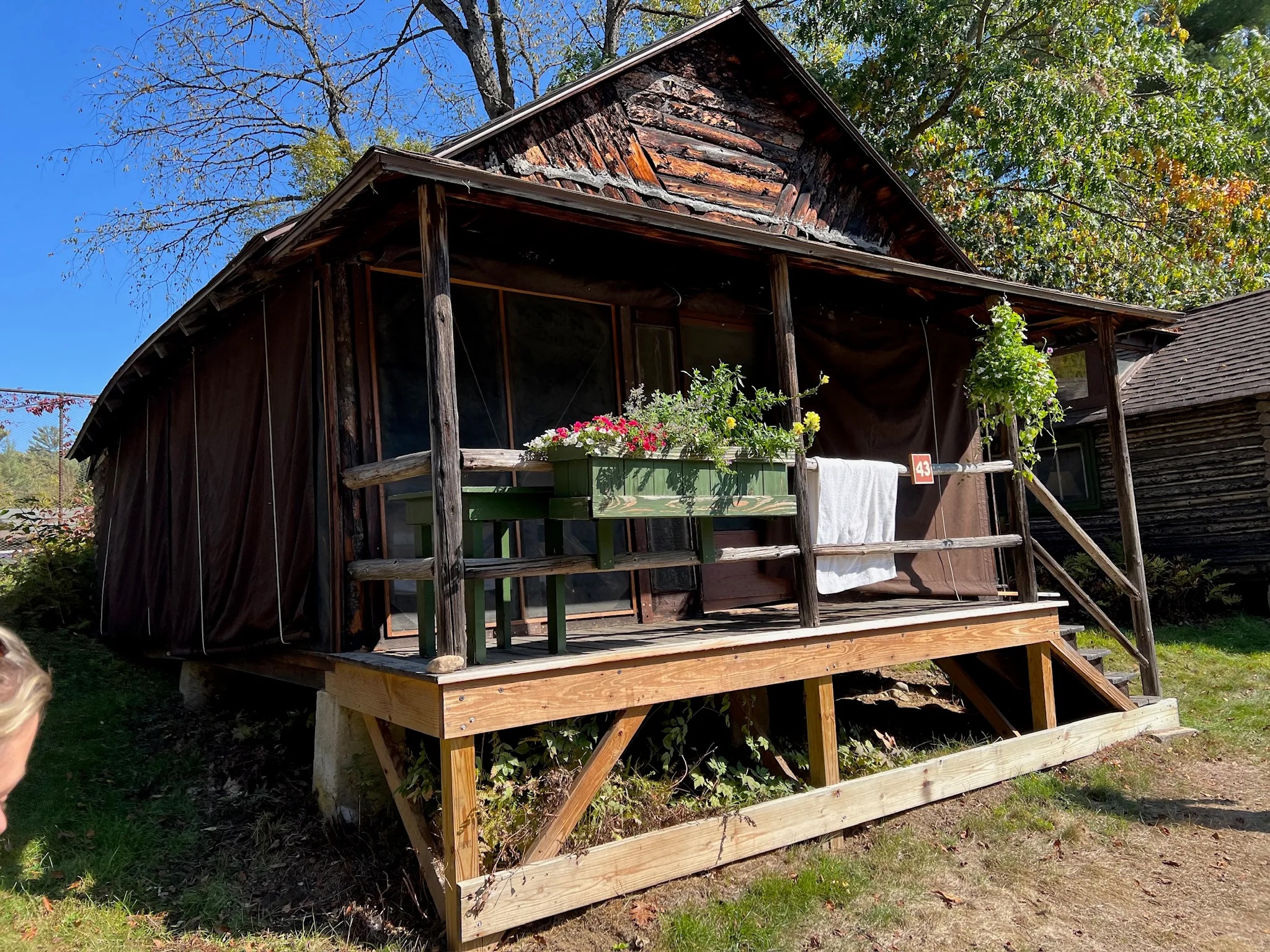 Adirondack cabin exterior in fall